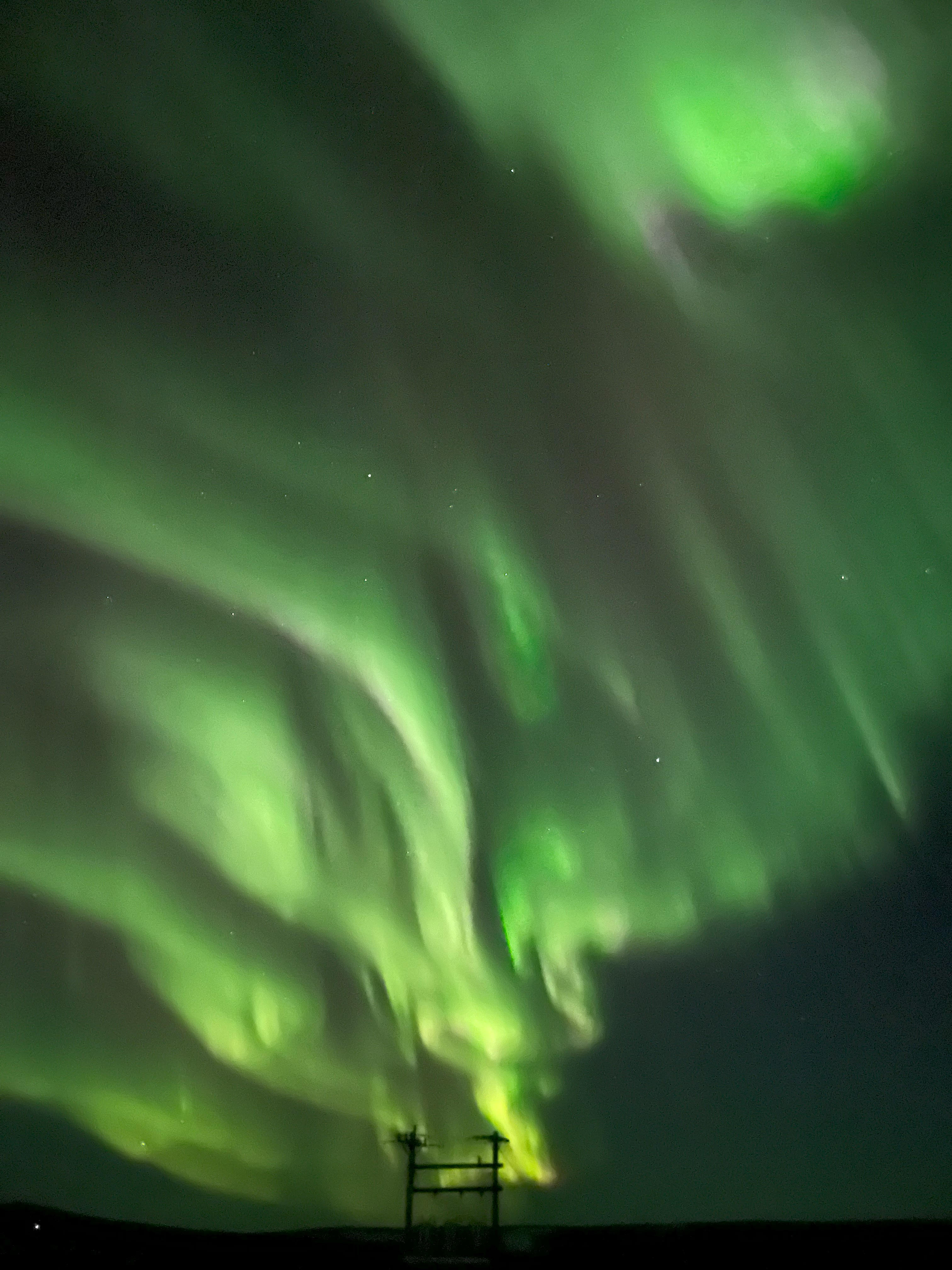 green auroral arcs