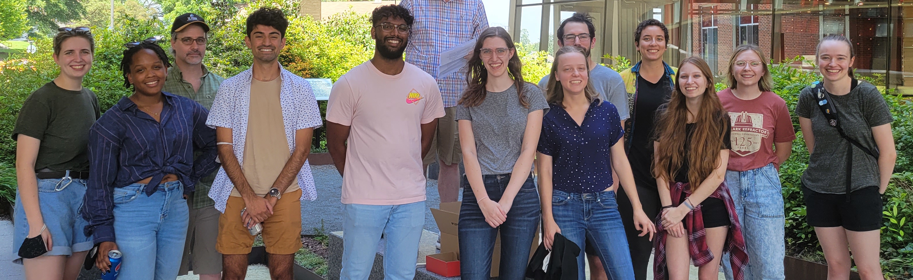 First- and second-year grad students, from left to right: Katya Leidig, Jordan Ealy, Jonathan Williams, Arjun, Gokul Srinivasaragavan, photo bomber, Emma Mirizio, Erika Hoffman, Calvin Osinga, Ell Bogat, Amanda Broadmeadow, Serena Cronin, Michaela Blain (photo credit Liz Tarantino)