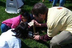 Dr. Trasco gets some help realigning the SunSpotter!