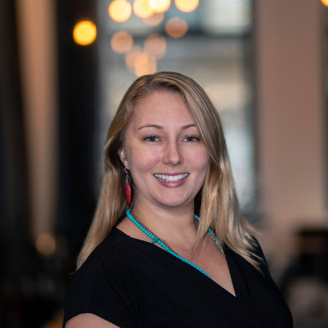 young blond woman, black dress