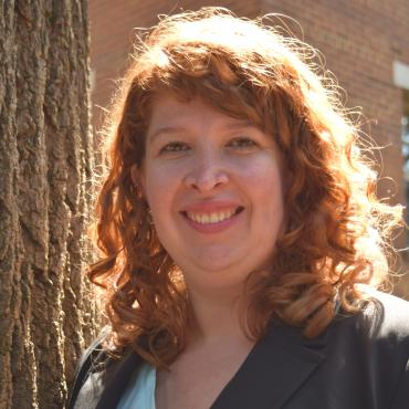 red-haired woman outside