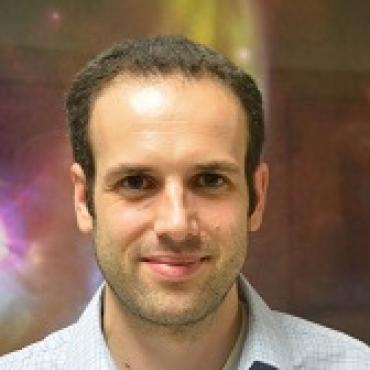 Claude-André Faucher-Giguère; man in front of spacy background