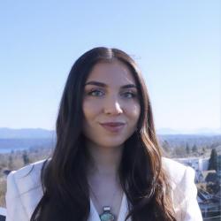 Akaxia Cruz; woman with long dark hair