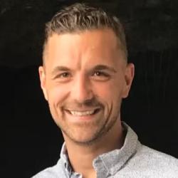 John Chisholm; man with short hair