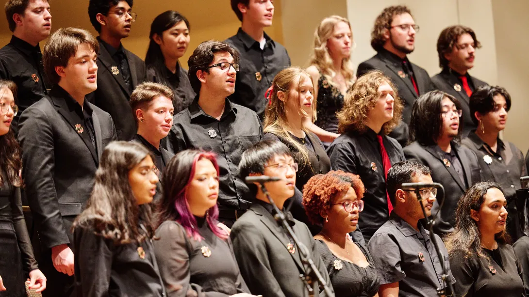 Choir members singing.